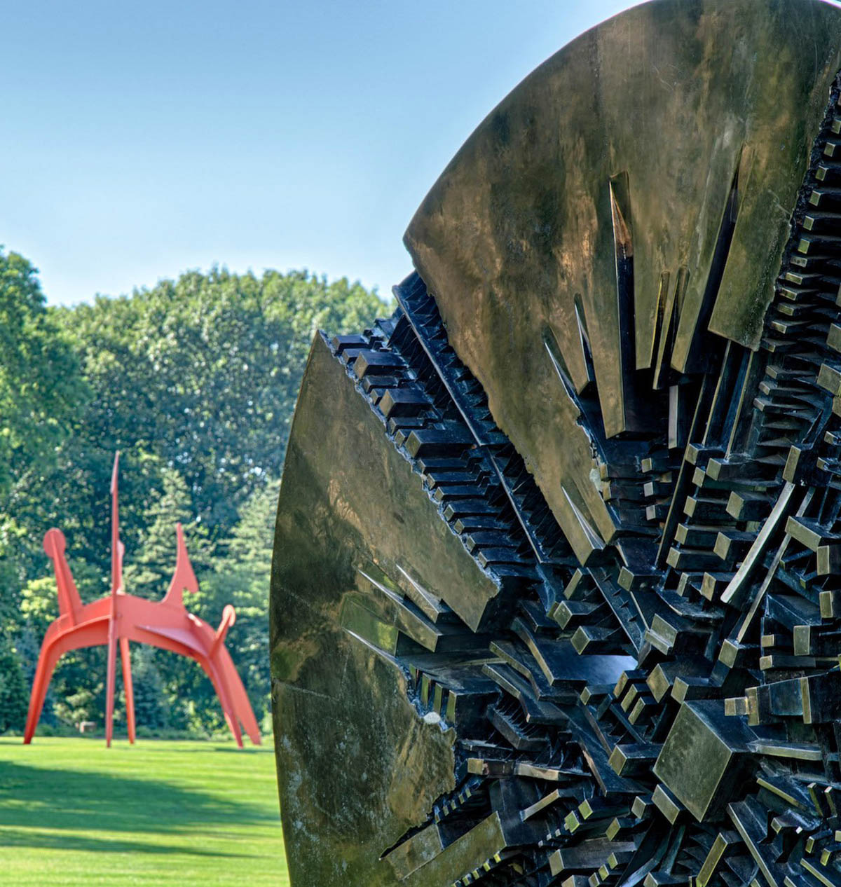 "The Wheel" by Seymour Lipton with "Hats Off" by Alexander Calder in the background