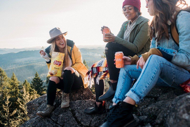 Group of friends talking and eating